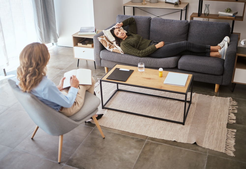 Psychologist,,Woman,And,Patient,Relax,On,Couch,For,Medical,Support,